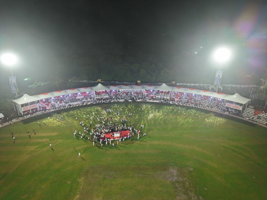 Evening stadium view with illuminated grandstand at 1919 Sportz